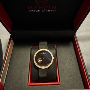 Women's Black and Gold Watch
